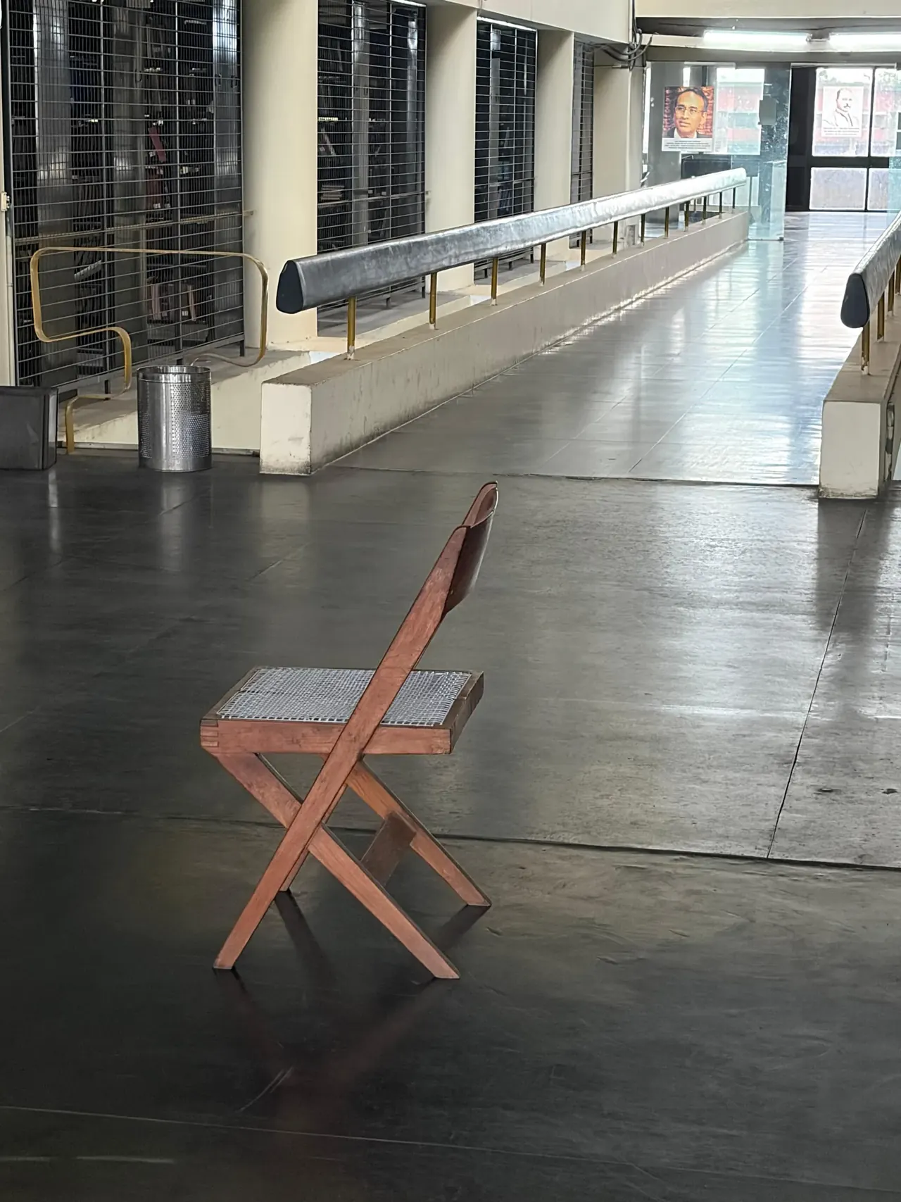 Original Pierre Jeanneret cane chair inside AC Joshi Library, Chandigarh architecture and design tour