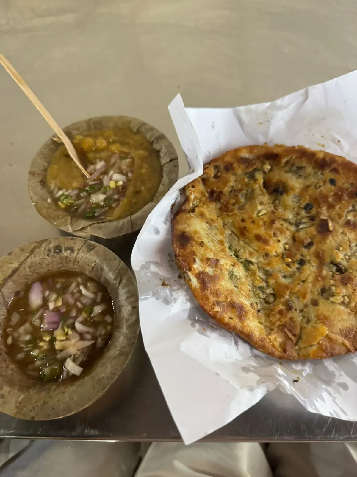 Stuffed kulcha served with chana curry and onion chutney, Amritsar Punjabi food trail tour