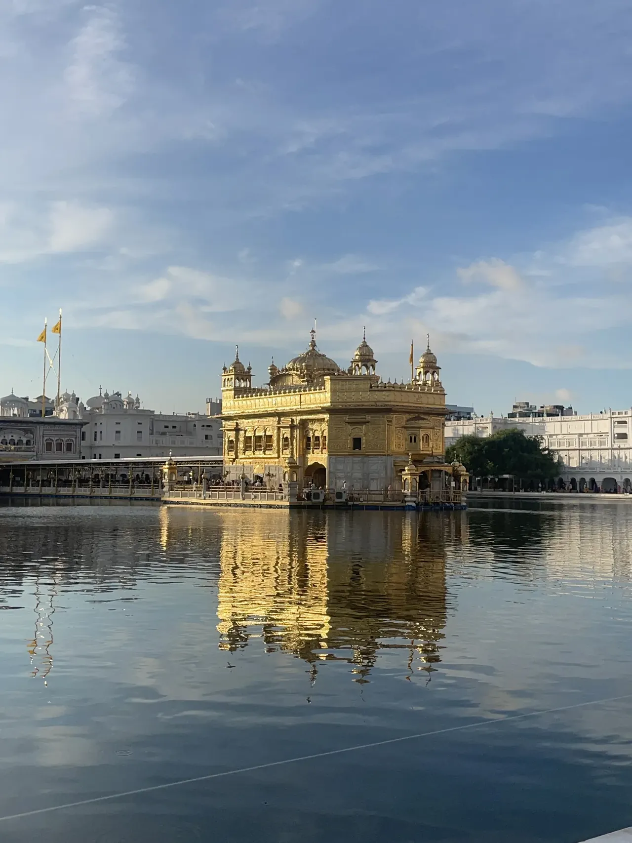 Golden Temple reflected in the sacred pool at dawn, Amritsar Sikh heritage architecture tour