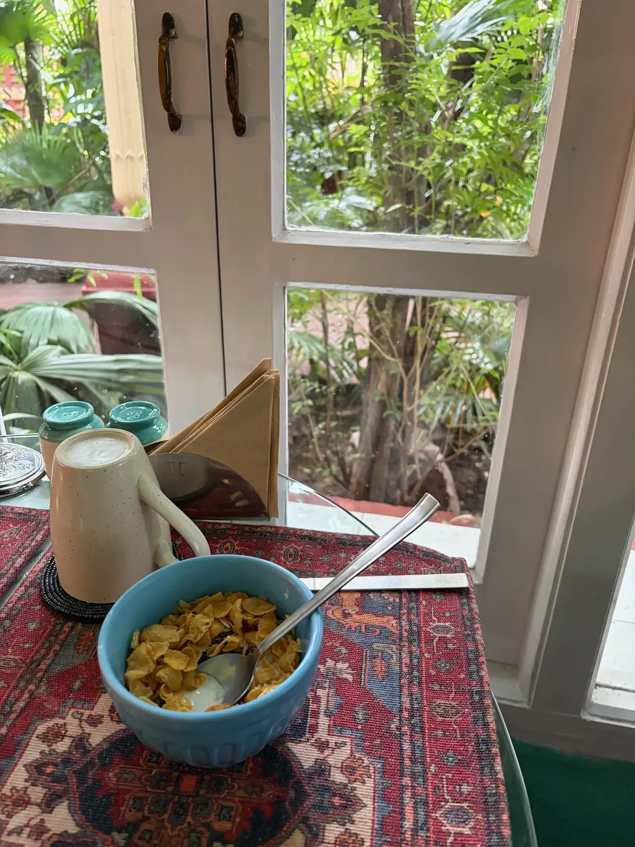 Breakfast nook overlooking the garden at the heritage boutique ancestral property, Amritsar tour stay