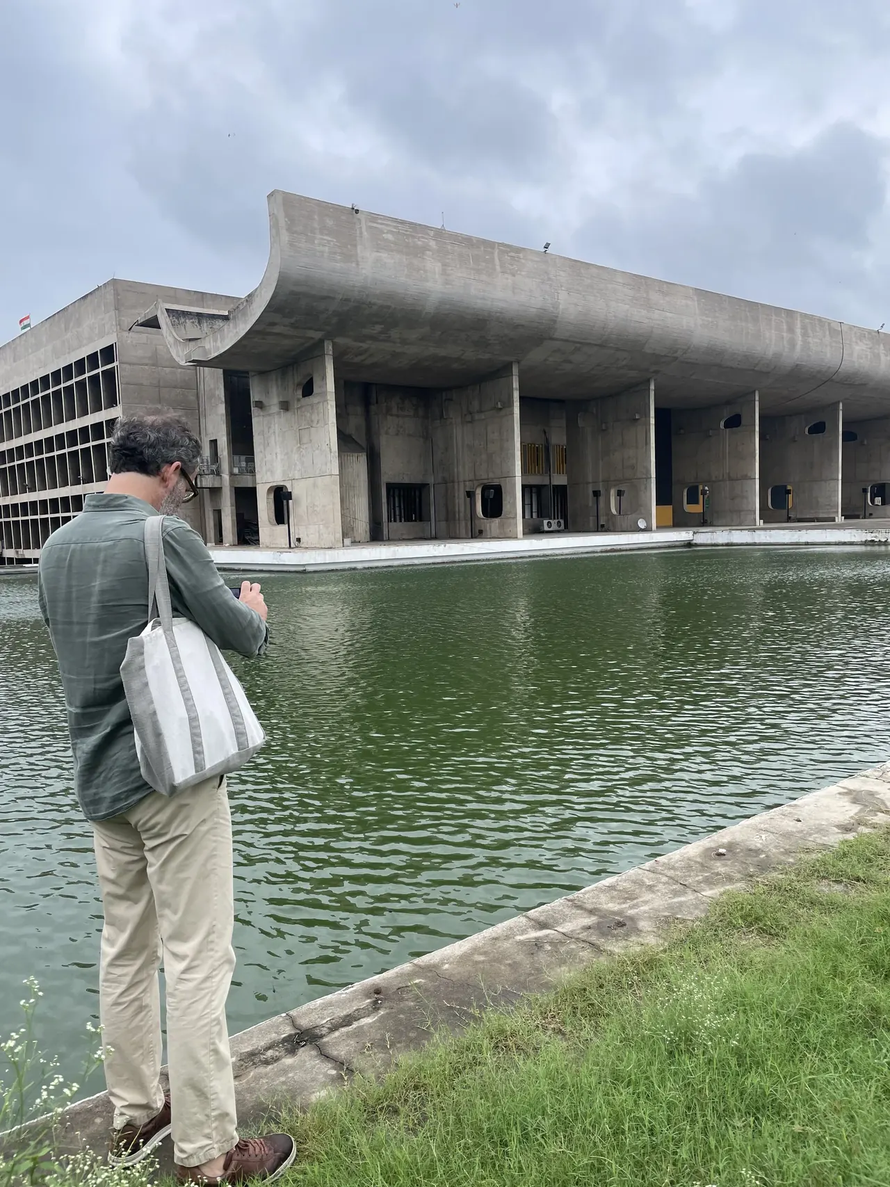 Palace of Assembly reflected in the forum pool, Le Corbusier's Chandigarh Capitol Complex architecture tour
