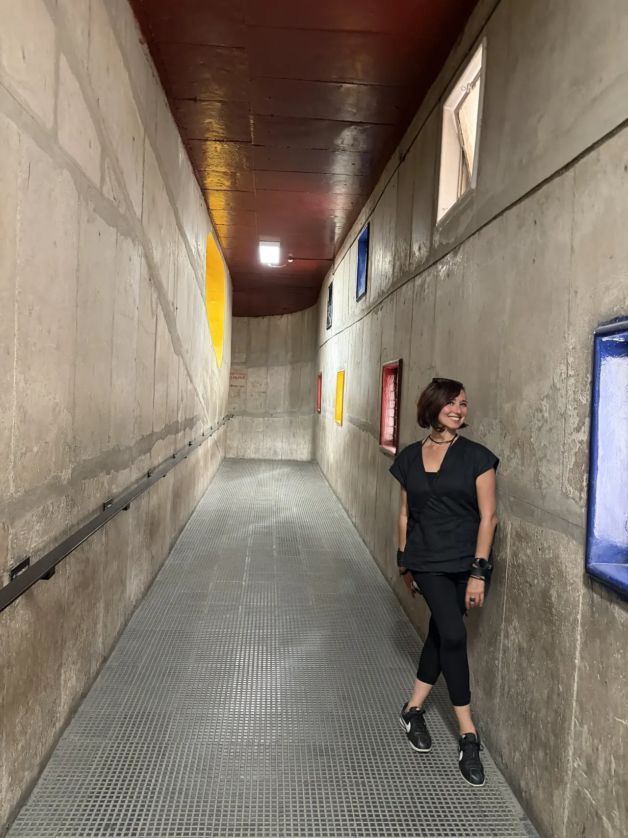 Colorful yellow, red and blue window insets in a Secretariat corridor, Le Corbusier architecture tour Chandigarh