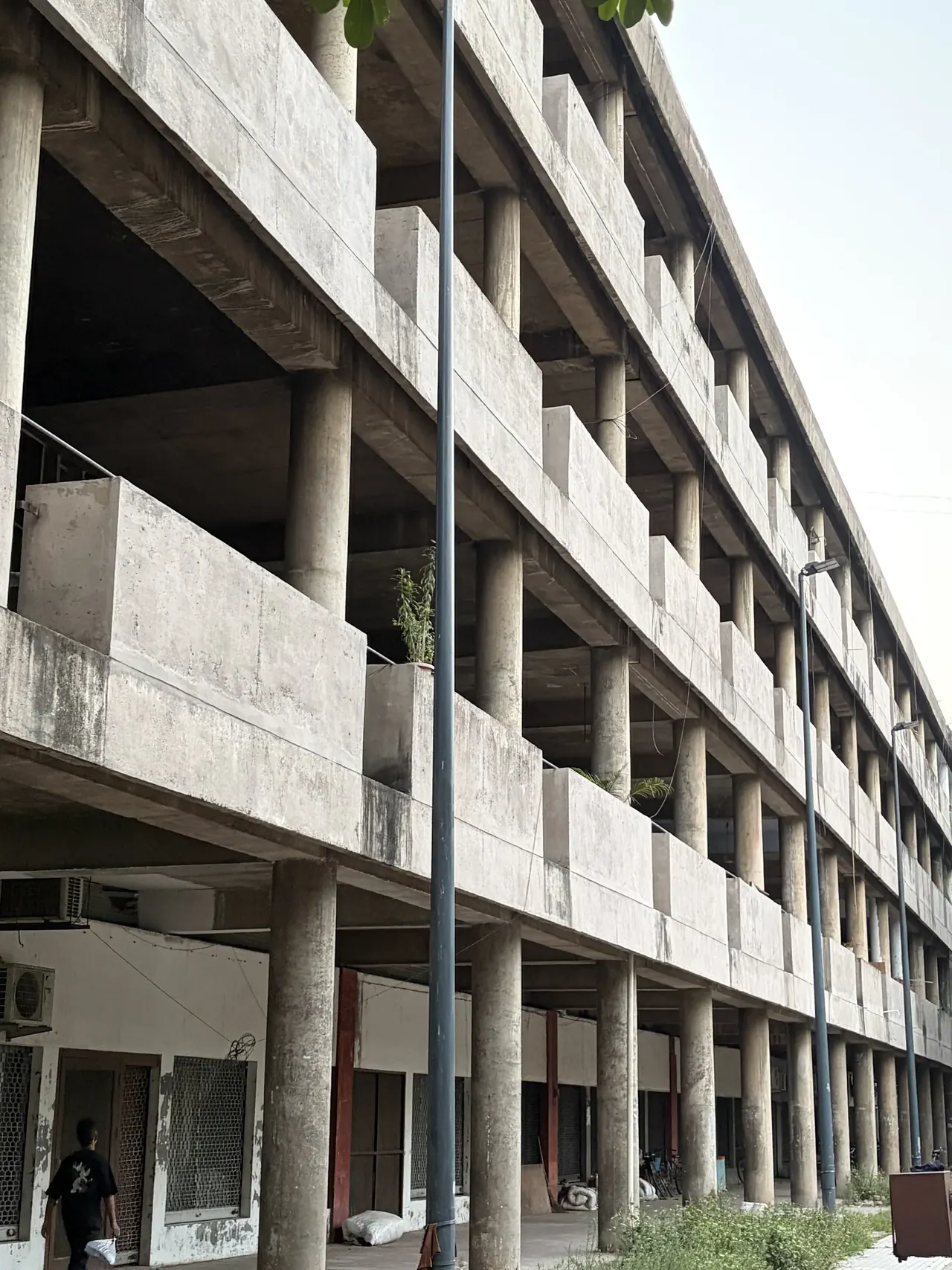 Sector 17 commercial plaza's concrete colonnade facade, Chandigarh Le Corbusier architecture tour