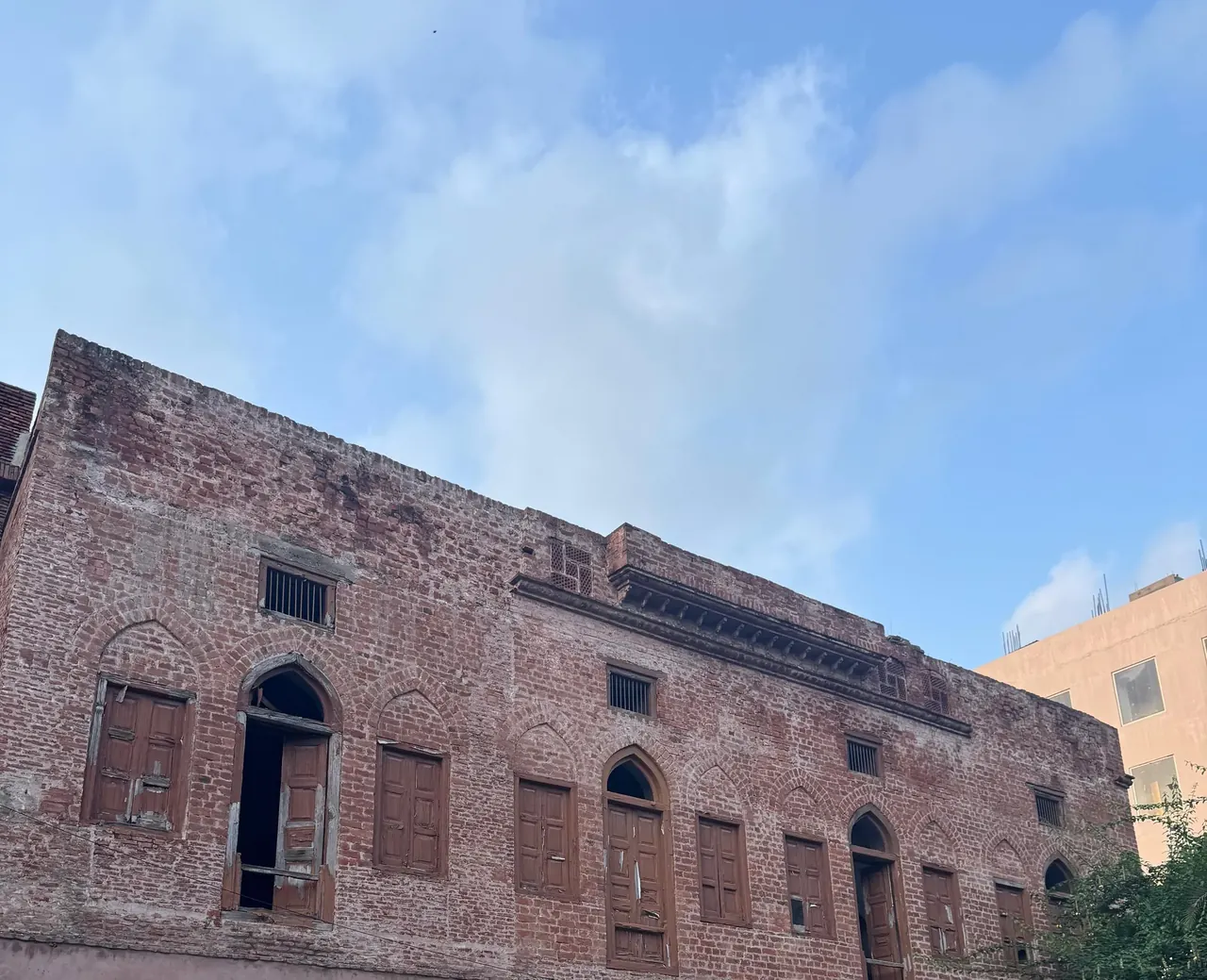 Historic brick heritage building facade in Amritsar old town, guided Town Hall heritage walk tour
